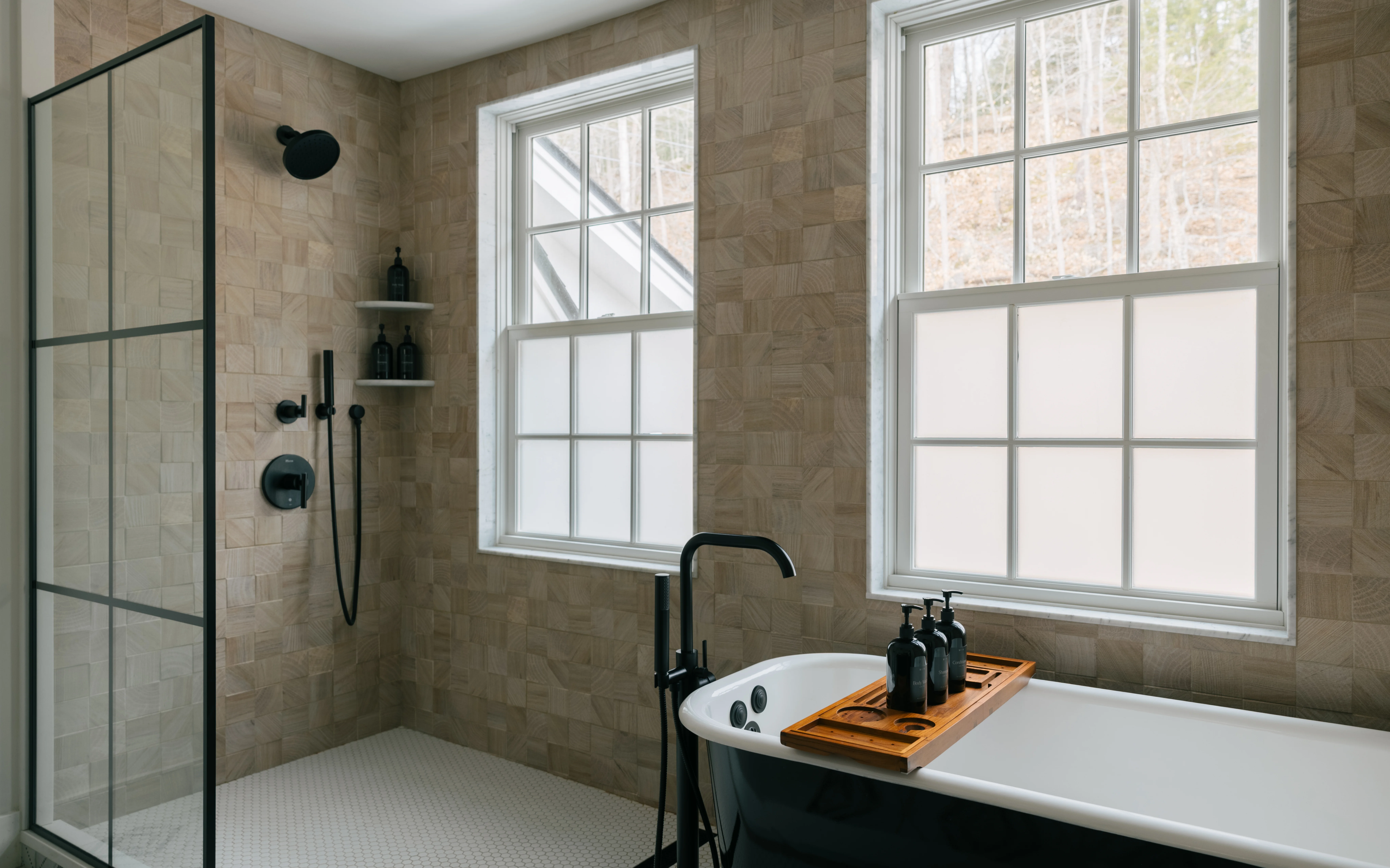 Master bath third view with emphasis on the freestanding tub and natural light